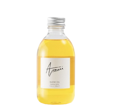 Arami Essentials Glow Oil Vanilla Spice is a nourishing skin and hair oil made with 100% Shea Nut Oil. It helps moisturize, soften and lock in moisture while leaving behind a warm and inviting vanilla spice fragrance.